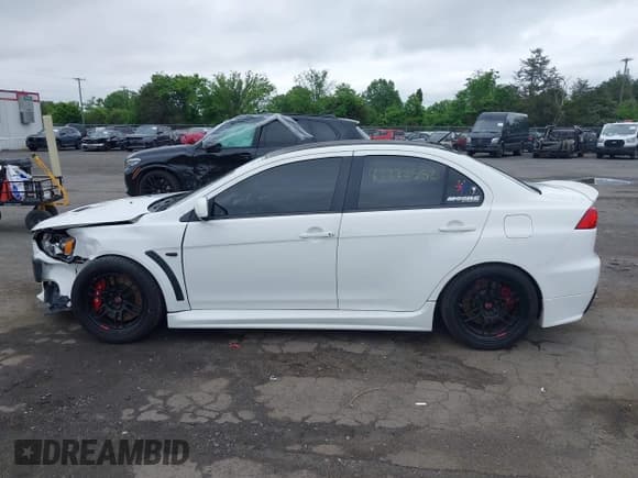 ✅ 2013 Mitsubishi Lancer Evolution GSR • VIN: JA32W8FV0DU023509 • Lot: 42222552. Wystawiony na IAAI z przebiegiem 128 030 mil. Bezpłatny archiwum sprzedaży aukcyjnych z USA i szczegółowy raport historii pojazdu na DreamBid. Zdjęcie 14.