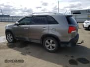 ✅ 2013 Kia Sorento EX • VIN: 5XYKUDA21DG411766 • Lot: 55960765. Listed on Copart with 159,584 mi. Free auction sales archive from the USA and detailed vehicle history report at DreamBid. Image 2.