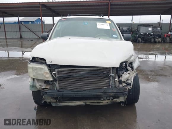 ✅ 2007 Mercury Mariner Convenience • VIN: 4M2YU80Z17KJ08849 • Lot: 41525410. Listed on IAAI with 227,293 mi. Free auction sales archive from the USA and detailed vehicle history report at DreamBid. Image 13.