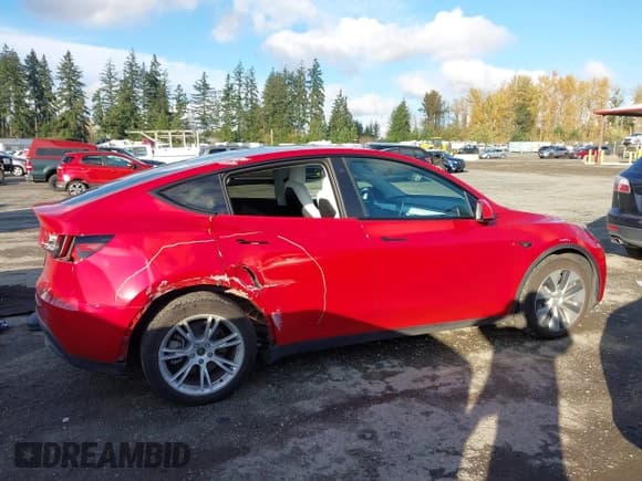 ✅ 2023 Tesla Model Y Long Range • VIN: 7SAYGDEE5PF604605 • Лот: 43663137. Опубликован ранее на IAAI с пробегом 25 264 миль. Бесплатный доступ к архиву аукционных продаж из США и подробный отчёт об истории автомобиля на DreamBid. Изображение 14.