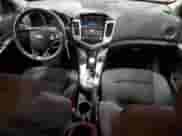 2015 Chevrolet Cruze LT z VIN 1G1PC5SB9F7203141, wystawiony jako Copart lot #64304965 z przebiegiem 146 768 mil mil oraz Szkoda całkowita • Salvage title. Historia ofert i sprzedaży dostępna na DreamBid. Obrazek 8.