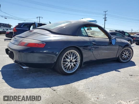 ✅ 2000 Porsche 911 • VIN: WP0CA2993YS652876 • Lot: 66330955. Listed on Copart with 106,678 mi. Free auction sales archive from the USA and detailed vehicle history report at DreamBid. Image 3.