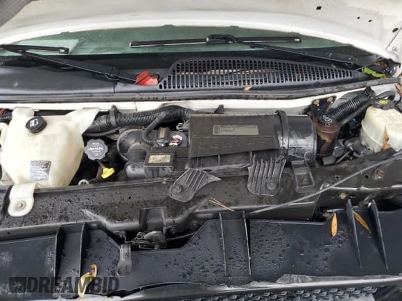 ✅ 2013 Chevrolet Express Cargo • VIN: 1GCWGFCA0D1903763 • Lot: 90007215. Listed on Copart with 223,250 mi. Free auction sales archive from the USA and detailed vehicle history report at DreamBid. Image 12.