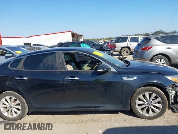 ✅ 2016 Kia Optima EX • VIN: 5XXGU4L31GG078988 • Lot: 43427738. Listed on IAAI with 97,321 mi. Free auction sales archive from the USA and detailed vehicle history report at DreamBid. Image 13.