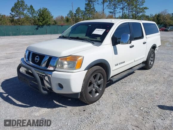 ✅ 2015 Nissan Titan SV • VIN: 1N6BA0ED5FN503033 • Lot: 41881909. Listed on IAAI with 151,432 mi. Free auction sales archive from the USA and detailed vehicle history report at DreamBid. Image 17.