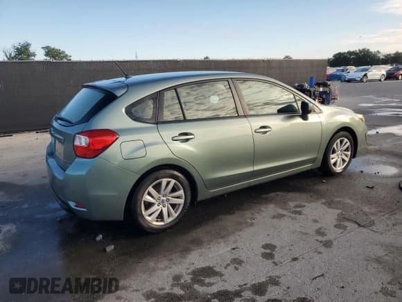 ✅ 2016 Subaru Impreza Premium • VIN: JF1GPAB69GH221857 • Lot: 90944555. Listed on Copart with 124,650 mi. Free auction sales archive from the USA and detailed vehicle history report at DreamBid. Image 3.