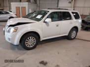 ✅ 2010 Mercury Mariner Premier • VIN: 4M2CN8HGXAKJ00279 • Lot: 41748487. Listed on IAAI with 116,565 mi. Free auction sales archive from the USA and detailed vehicle history report at DreamBid. Image 2.