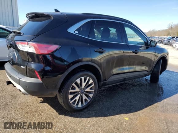 ✅ 2020 Ford Escape Titanium • VIN: 1FMCU9J92LUA80719 • Lot: 39835324. Listed on Copart with 63,203 mi. Free auction sales archive from the USA and detailed vehicle history report at DreamBid. Image 3.