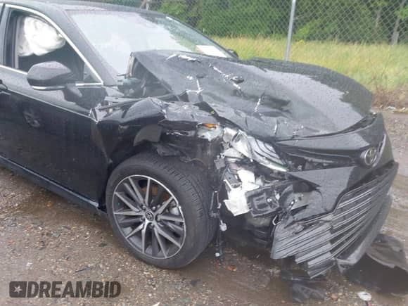 2022 Toyota Camry XLE z VIN 4T1F11AK8NU076638, wystawiony jako IAAI lot #42243093 z przebiegiem 67 100 mil mil oraz . Historia ofert i sprzedaży dostępna na DreamBid. Obrazek 6.