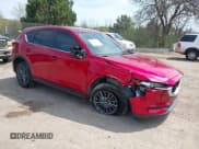 ✅ 2020 Mazda CX-5 Touring • VIN: JM3KFBCM2L0846174 • Lot: 42203758. Wystawiony na IAAI z przebiegiem 58 617 mil. Bezpłatny archiwum sprzedaży aukcyjnych z USA i szczegółowy raport historii pojazdu na DreamBid. Zdjęcie 1.