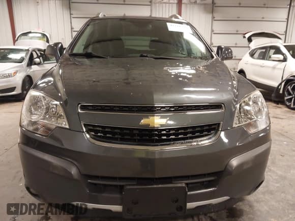 ✅ 2013 Chevrolet Captiva Sport LS • VIN: 3GNFL2EK7DS516739 • Lot: 42216391. Wystawiony na IAAI z przebiegiem 69 638 mil. Bezpłatny archiwum sprzedaży aukcyjnych z USA i szczegółowy raport historii pojazdu na DreamBid. Zdjęcie 12.