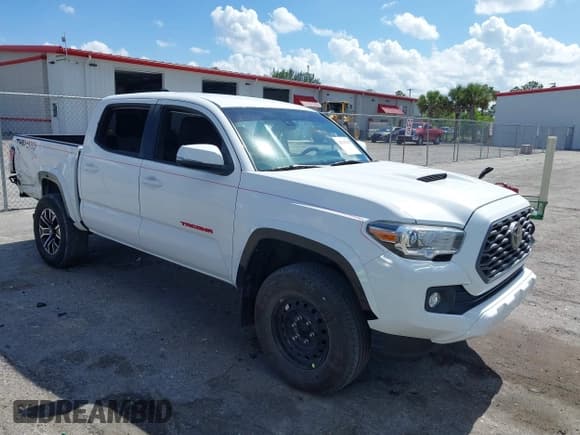 ✅ 2020 Toyota Tacoma SR5 • VIN: 3TMCZ5AN1LM360874 • Lot: 42525330. Listed on IAAI with 49,266 mi. Free auction sales archive from the USA and detailed vehicle history report at DreamBid. Image 1.