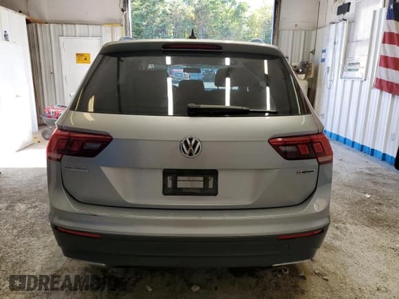 ✅ 2020 Volkswagen Tiguan S • VIN: 3VV0B7AX8LM113955 • Lot: 84452755. Listed on Copart with 30,970 mi. Free auction sales archive from the USA and detailed vehicle history report at DreamBid. Image 6.