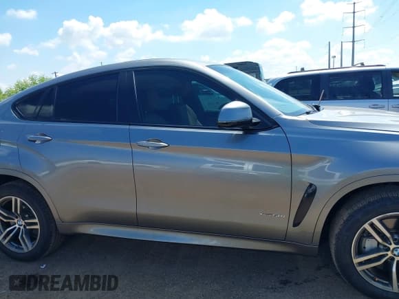 ✅ 2015 BMW X6 xDrive50i • VIN: 5UXKU6C54F0F93945 • Lot: 43042471. Listed on IAAI with 52,434 mi. Free auction sales archive from the USA and detailed vehicle history report at DreamBid. Image 13.