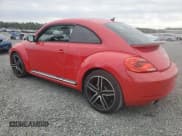 ✅ 2012 Volkswagen Beetle Turbo • VIN: 3VW467AT7CM649911 • Lot: 76279714. Listed on Copart with 117,326 mi. Free auction sales archive from the USA and detailed vehicle history report at DreamBid. Image 2.