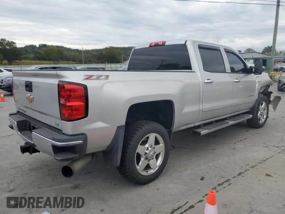 ✅ 2015 Chevrolet Silverado 2500HD LTZ • VIN: 1GC1KWE88FF106976 • Lot: 82219705. Listed on Copart with 149,611 mi. Free auction sales archive from the USA and detailed vehicle history report at DreamBid. Image 3.