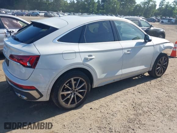 ✅ 2023 Audi SQ5 Sportback Premium Plus • VIN: WA124AFY3P2110694 • Лот: 42551929. Опубликован ранее на IAAI с пробегом 19 050 миль. Бесплатный доступ к архиву аукционных продаж из США и подробный отчёт об истории автомобиля на DreamBid. Изображение 4.