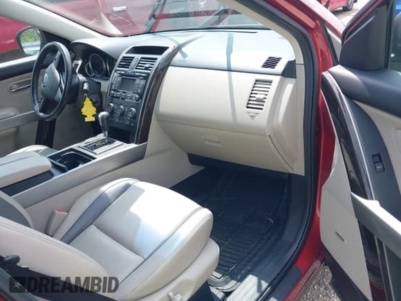 ✅ 2011 Mazda CX-9 Grand Touring • VIN: JM3TB3DA5B0316595 • Лот: 42849889. Опубликован ранее на IAAI с пробегом 232 619 миль. Бесплатный доступ к архиву аукционных продаж из США и подробный отчёт об истории автомобиля на DreamBid. Изображение 5.