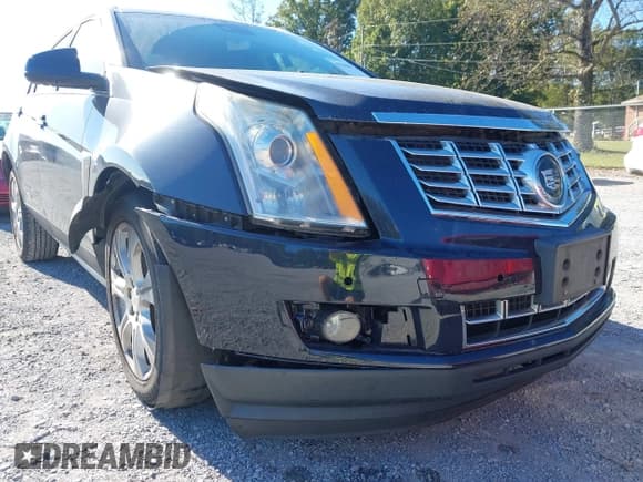 ✅ 2015 Cadillac SRX Premium Collection • VIN: 3GYFNDE38FS545137 • Lot: 43380706. Wystawiony na IAAI z przebiegiem 137 317 mil. Bezpłatny archiwum sprzedaży aukcyjnych z USA i szczegółowy raport historii pojazdu na DreamBid. Zdjęcie 22.