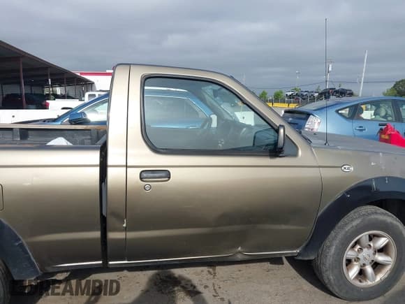 ✅ 2001 Nissan Frontier XE • VIN: 1N6DD21SX1C308632 • Lot: 42100901. Listed on IAAI with 150,600 mi. Free auction sales archive from the USA and detailed vehicle history report at DreamBid. Image 13.