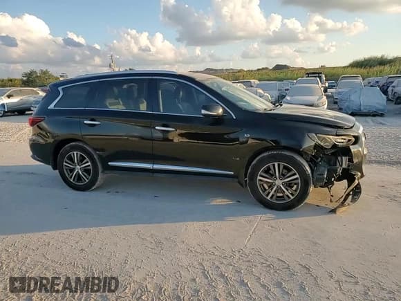 ✅ 2017 Infiniti QX60 • VIN: 5N1DL0MNXHC519416 • Лот: 92922805. Опубликован ранее на Copart с пробегом 122 745 миль. Бесплатный доступ к архиву аукционных продаж из США и подробный отчёт об истории автомобиля на DreamBid. Изображение 14.