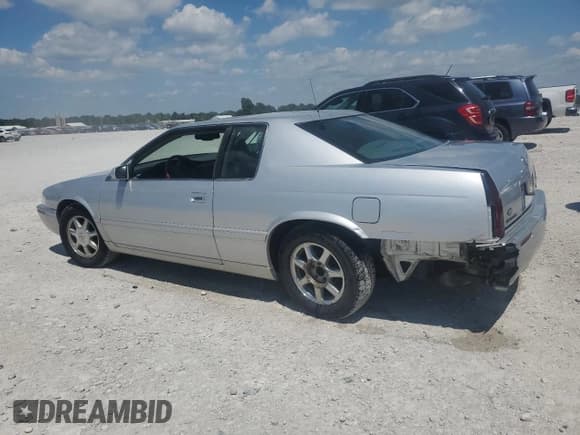 ✅ 2002 Cadillac Eldorado Touring • VIN: 1G6ET12942B102314 • Lot: 62061185. Listed on Copart with 64,069 mi. Free auction sales archive from the USA and detailed vehicle history report at DreamBid. Image 2.
