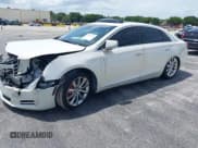 ✅ 2014 Cadillac XTS Luxury • VIN: 2G61M5S33E9326484 • Lot: 43119276. Listed on IAAI with 99,833 mi. Free auction sales archive from the USA and detailed vehicle history report at DreamBid. Image 2.
