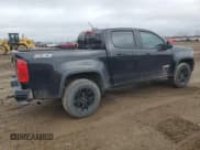 ✅ 2016 Chevrolet Colorado 4WD Z71 • VIN: 1GCGTDE38G1388552 • Лот: 45889164. Опубликован ранее на Copart с пробегом 181 622 миль. Бесплатный доступ к архиву аукционных продаж из США и подробный отчёт об истории автомобиля на DreamBid. Изображение 3.