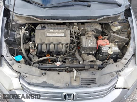 ✅ 2011 Honda Insight • VIN: JHMZE2H36BS004868 • Лот: 43719131. Опубликован ранее на IAAI с пробегом 367 130 миль. Бесплатный доступ к архиву аукционных продаж из США и подробный отчёт об истории автомобиля на DreamBid. Изображение 10.