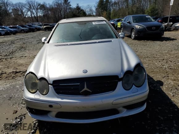 ✅ 2003 Mercedes-Benz CLK 55 AMG • VIN: WDBTJ76H53F057858 • Лот: 51440375. Опубликован ранее на Copart с пробегом 119 972 миль. Бесплатный доступ к архиву аукционных продаж из США и подробный отчёт об истории автомобиля на DreamBid. Изображение 5.