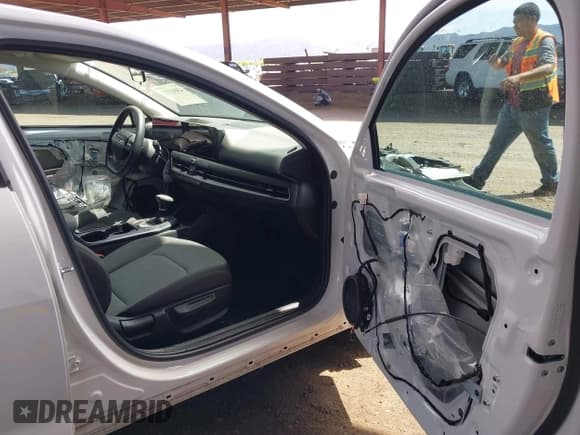 ✅ 2025 Kia K4 LXS • VIN: 3KPFT4DE5SE125181 • Lot: 43011727. Listed on IAAI with 13,267 mi. Free auction sales archive from the USA and detailed vehicle history report at DreamBid. Image 5.