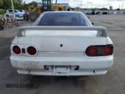 ✅ 1993 Nissan Skyline • VIN: BNR32301407 • Lot: 88086635. Wystawiony na Copart z przebiegiem 183 153 mil. Bezpłatny archiwum sprzedaży aukcyjnych z USA i szczegółowy raport historii pojazdu na DreamBid. Zdjęcie 6.