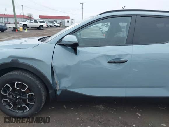 2023 Hyundai Santa Cruz SEL z VIN 5NTJCDAE7PH071384, wystawiony jako IAAI lot #41284372 z przebiegiem 29 160 mil mil oraz . Historia ofert i sprzedaży dostępna na DreamBid. Obrazek 6.