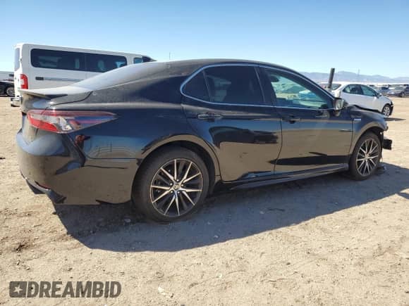 2021 Toyota Camry Hybrid SE с VIN 4T1G31AK2MU564917, выставлен на аукционе Copart как лот 71824255 с пробегом 181 375 миль миль и Списание • Salvage title. История ставок и продаж доступна на DreamBid. Изображение 3.