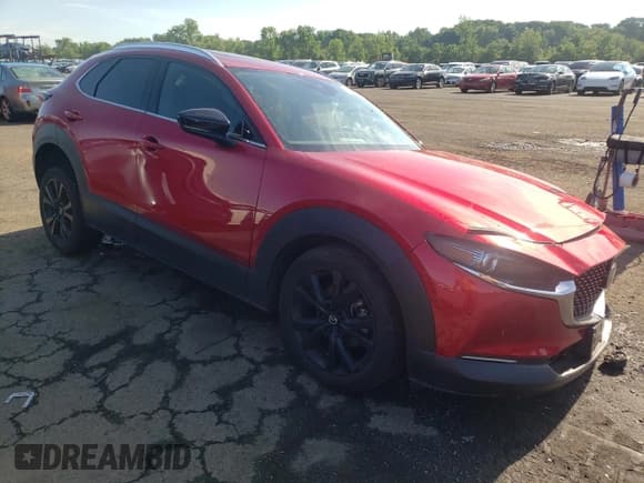 ✅ 2021 Mazda CX-30 Premium • VIN: 3MVDMBDY2MM265585 • Lot: 56051584. Wystawiony na Copart z przebiegiem 20 156 mil. Bezpłatny archiwum sprzedaży aukcyjnych z USA i szczegółowy raport historii pojazdu na DreamBid. Zdjęcie 4.