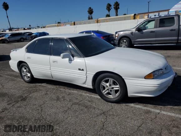 ✅ 1999 Pontiac Bonneville SE • VIN: 1G2HX52K1XH230723 • Lot: 86333265. Listed on Copart with 126,106 mi. Free auction sales archive from the USA and detailed vehicle history report at DreamBid. Image 4.