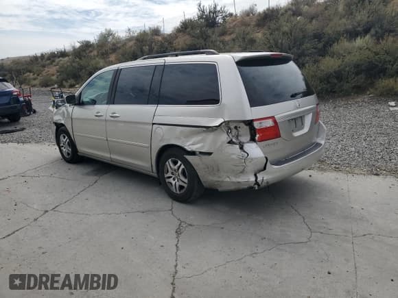 ✅ 2006 Honda Odyssey EX-L • VIN: 5FNRL38656B410666 • Лот: 80554015. Опубликован ранее на Copart с пробегом 243 001 миль. Бесплатный доступ к архиву аукционных продаж из США и подробный отчёт об истории автомобиля на DreamBid. Изображение 2.