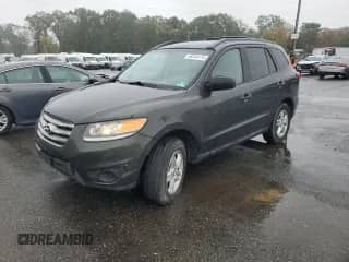 2012 Hyundai Santa Fe GLS z VIN 5XYZGDAB3CG143310, wystawiony jako Copart lot #86744115 z przebiegiem 201 540 mil mil oraz Czysty tytuł • Clean title. Historia ofert i sprzedaży dostępna na DreamBid. Obrazek 1.