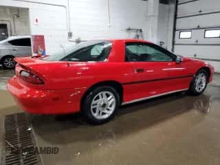 1994 Chevrolet Camaro z VIN 2G1FP22S0R2105030, wystawiony jako Copart lot #45131955 z przebiegiem 166 107 mil mil oraz Czysty tytuł • Clean title. Historia ofert i sprzedaży dostępna na DreamBid. Obrazek 3.