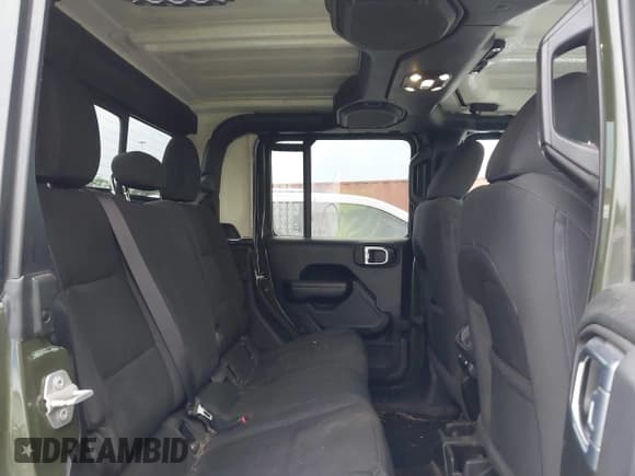 ✅ 2022 Jeep Gladiator Texas Trail • VIN: 1C6HJTAG1NL105124 • Лот: 42601707. Опубликован ранее на IAAI с пробегом 52 064 миль. Бесплатный доступ к архиву аукционных продаж из США и подробный отчёт об истории автомобиля на DreamBid. Изображение 8.