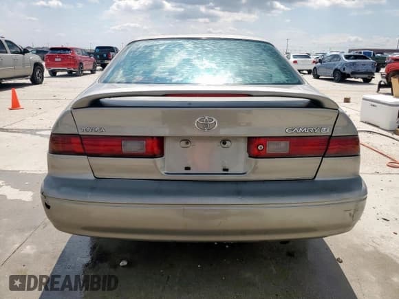 ✅ 1999 Toyota Camry LE • VIN: JT2BG22K4X0266090 • Lot: 71183525. Wystawiony na Copart z przebiegiem 219 373 mil. Bezpłatny archiwum sprzedaży aukcyjnych z USA i szczegółowy raport historii pojazdu na DreamBid. Zdjęcie 6.