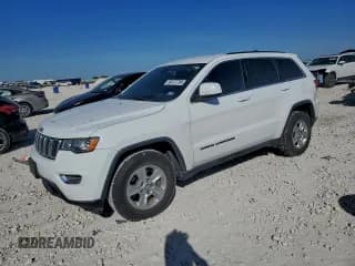 ✅ 2017 Jeep Grand Cherokee Laredo • VIN: 1C4RJEAG6HC716411 • Lot: 96372795. Listed on Copart with 135,435 mi. Free auction sales archive from the USA and detailed vehicle history report at DreamBid. Image 1.