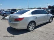 ✅ 2013 Buick LaCrosse Leather • VIN: 1G4GC5E30DF149481 • Lot: 42121632. Listed on IAAI with 166,242 mi. Free auction sales archive from the USA and detailed vehicle history report at DreamBid. Image 4.