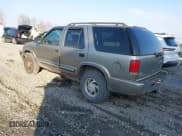 ✅ 2001 Chevrolet Blazer LT • VIN: 1GNDT13W212167763 • Lot: 41997079. Wystawiony na IAAI z przebiegiem 173 050 mil. Bezpłatny archiwum sprzedaży aukcyjnych z USA i szczegółowy raport historii pojazdu na DreamBid. Zdjęcie 3.