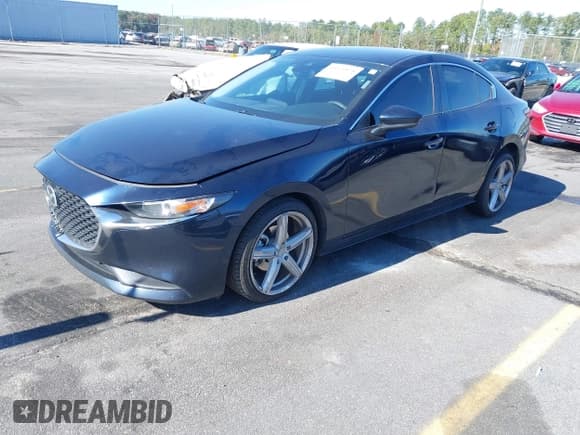 ✅ 2021 Mazda 3 Select • VIN: JM1BPABL1M1342803 • Lot: 43694828. Listed on IAAI with 121,183 mi. Free auction sales archive from the USA and detailed vehicle history report at DreamBid. Image 17.