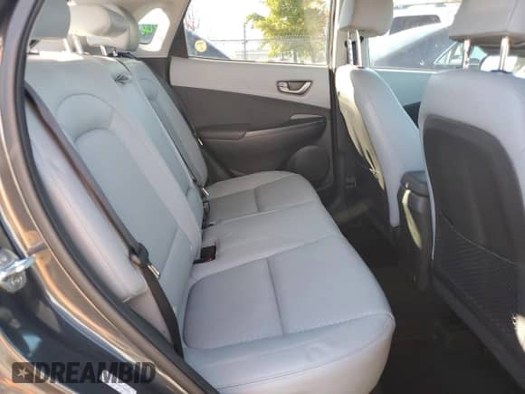 2019 Hyundai Kona Ultimate z VIN KM8K53A50KU380583, wystawiony jako Copart lot #86679545 z przebiegiem 60 869 mil mil oraz Szkoda całkowita • Salvage title. Historia ofert i sprzedaży dostępna na DreamBid. Obrazek 11.