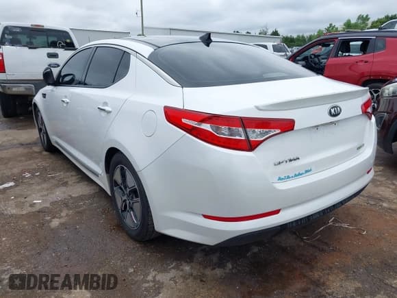 ✅ 2012 Kia Optima Hybrid • VIN: KNAGM4AD2C5035784 • Lot: 43102923. Listed on IAAI with 92,734 mi. Free auction sales archive from the USA and detailed vehicle history report at DreamBid. Image 3.