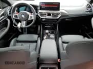 ✅ 2022 BMW X4 M • VIN: 5YM23EC00N9M68670 • Lot: 80404663. Wystawiony na Copart z przebiegiem 5 979 mil. Bezpłatny archiwum sprzedaży aukcyjnych z USA i szczegółowy raport historii pojazdu na DreamBid. Zdjęcie 8.