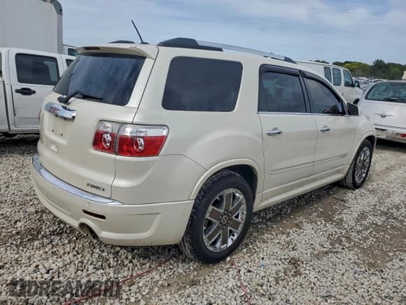 ✅ 2012 GMC Acadia Denali • VIN: 1GKKVTEDXCJ329413 • Lot: 96786985. Listed on Copart with 135,914 mi. Free auction sales archive from the USA and detailed vehicle history report at DreamBid. Image 3.