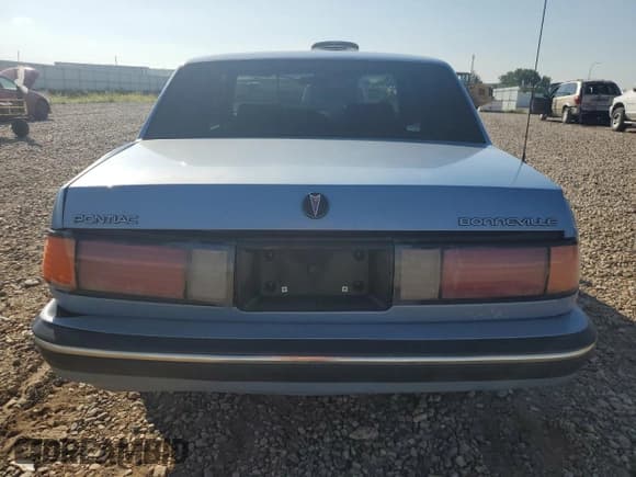 ✅ 1990 Pontiac Bonneville • VIN: 1G2HX54C0L1229409 • Лот: 69831185. Опубликован ранее на Copart с пробегом 134 084 миль. Бесплатный доступ к архиву аукционных продаж из США и подробный отчёт об истории автомобиля на DreamBid. Изображение 6.